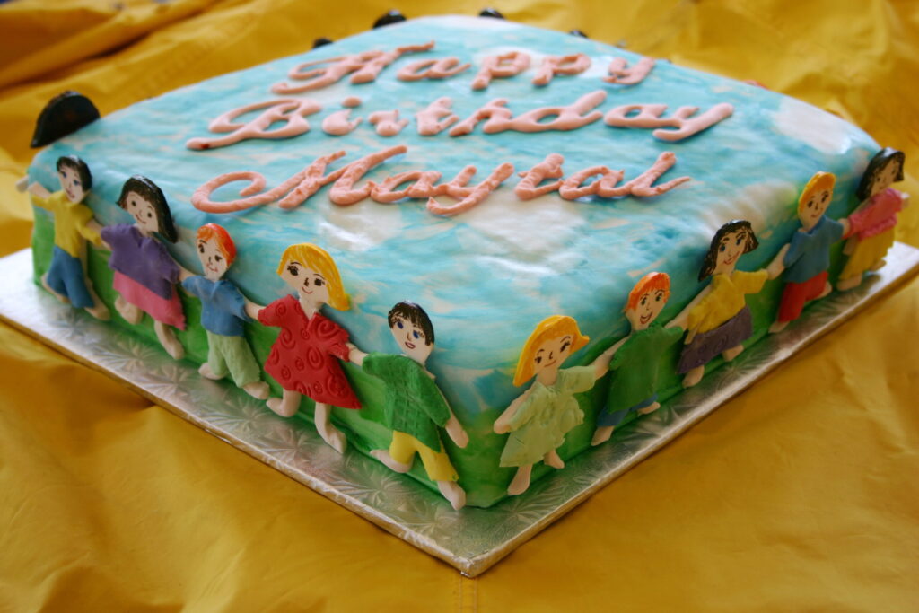 Children Holding Hands Cake